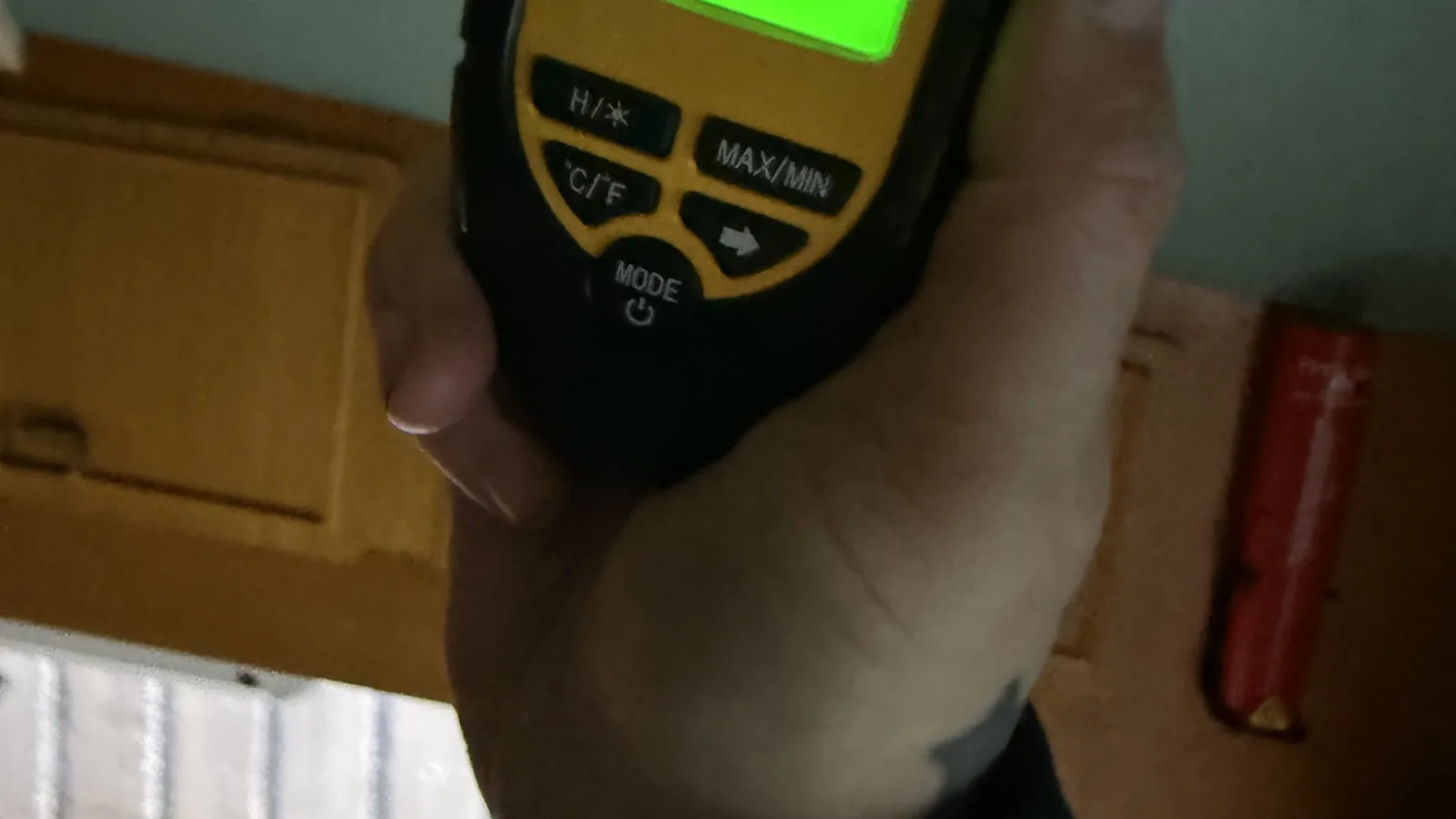 Digital tyre pressure gauge in hand